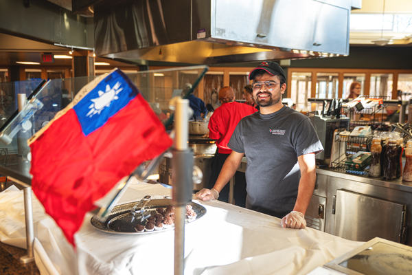 Dining service cook who is ready to create your meal